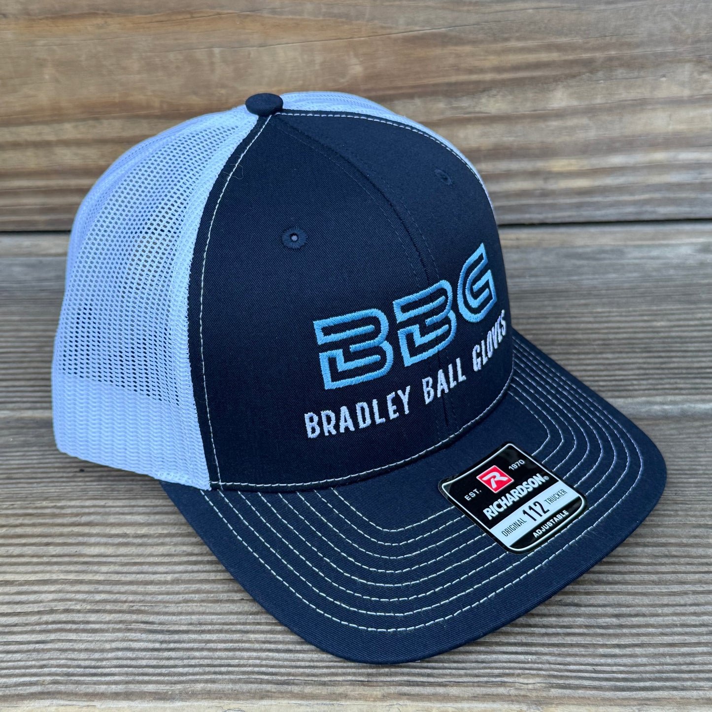 Bradley BBG Trucker Hat Navy/White/Carolina